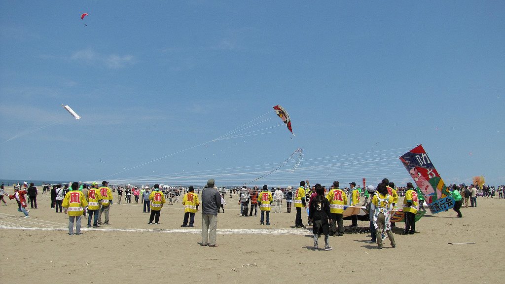 Preparing to launch massive kites at Uchinada's Peaceful World Kite Festival