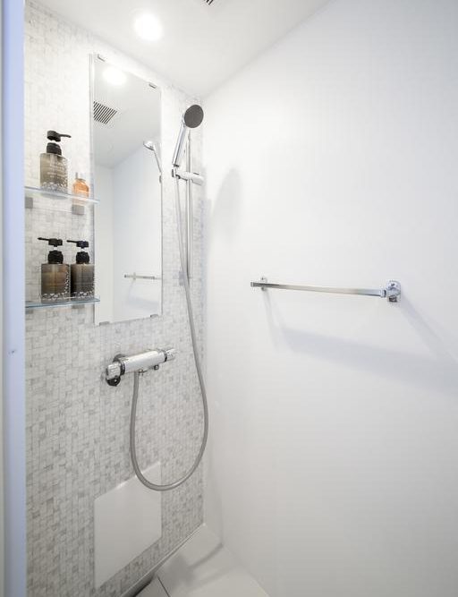 roomy private shower booth in kaname hostel on tatemachi kanazawa