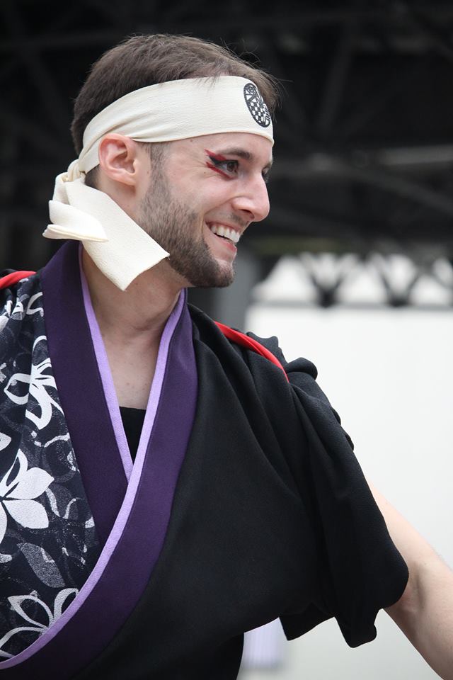 Drew dancing with his Yosakoi team at Kanazawa Station, by Tamaya Greenlee