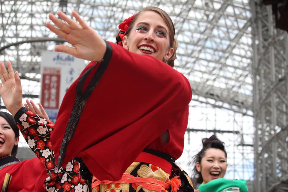 Sarah performing yosakoi with her team at Kanazawa Station, by Tamaya Greenlee