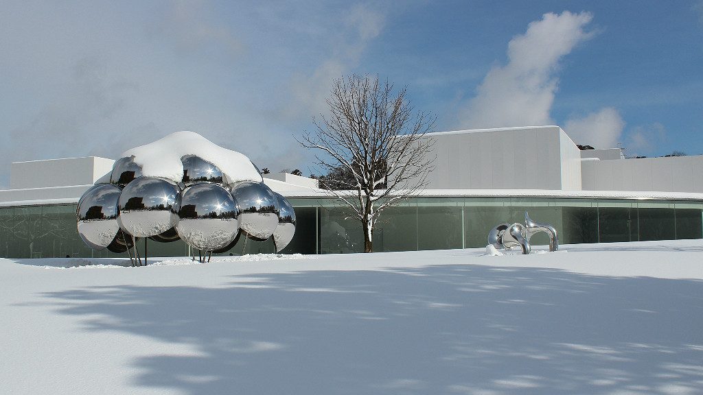 The 21st Century Museum of Contemporary Art with Outdoor Exhibitions in snow, Kanazawa winter