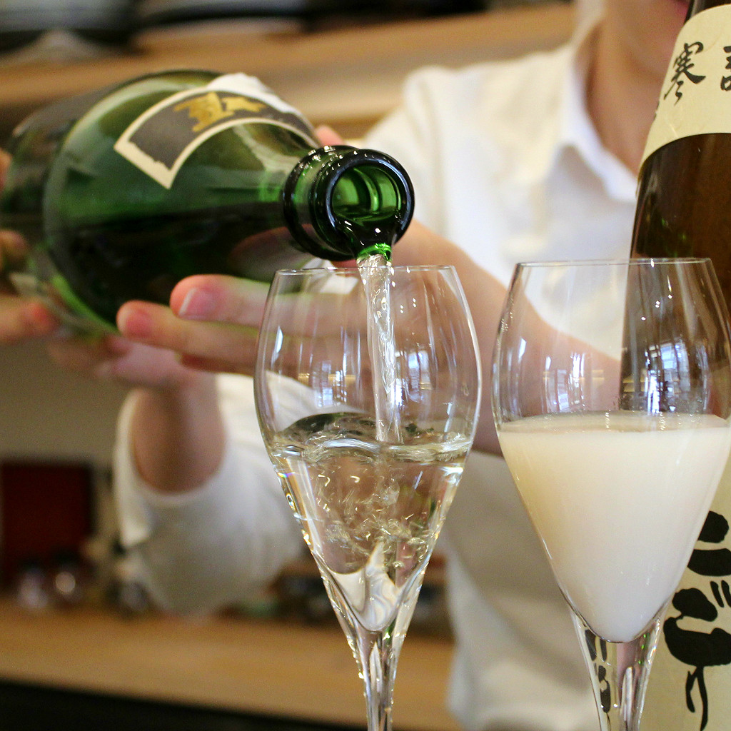 Nihonshu, or sake poured in a tasting glass