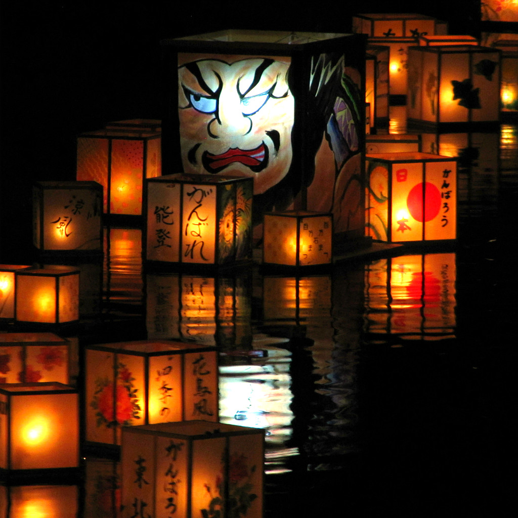 kaga yuzen lanterns float down the Asano River for Hyakumangoku Festival