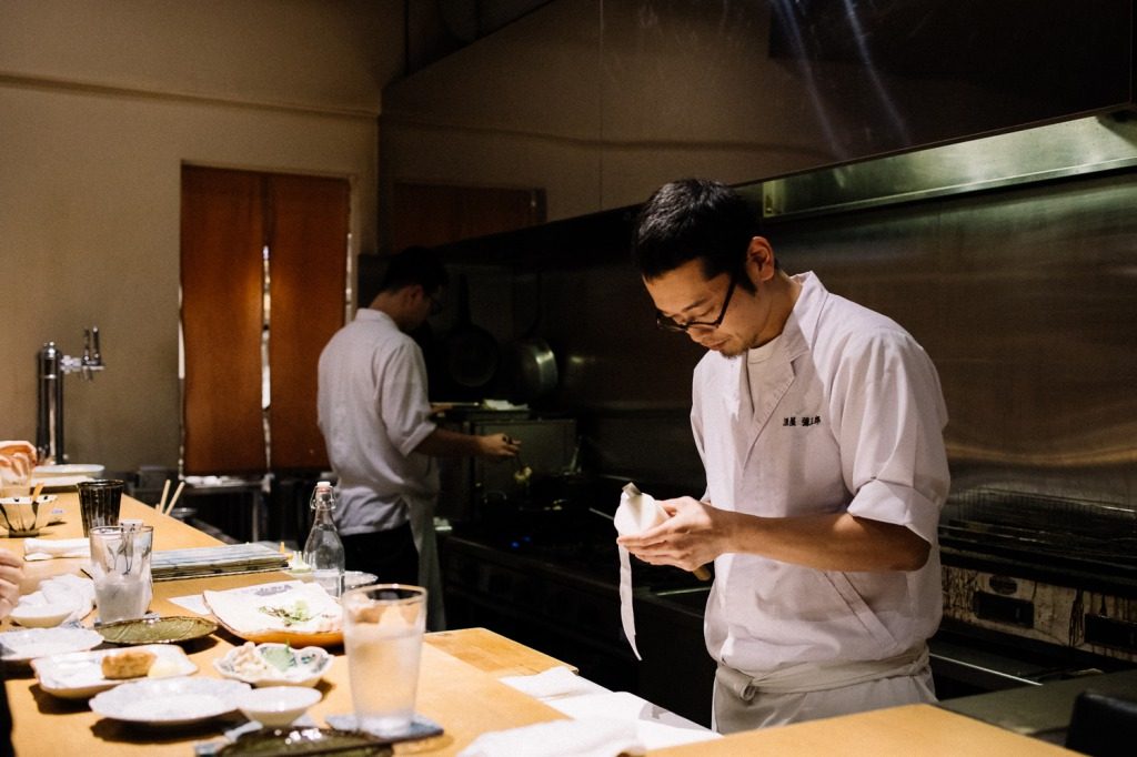 The chef at work at Yasaburo, Japanese cuisine in Kanazawa, Japan