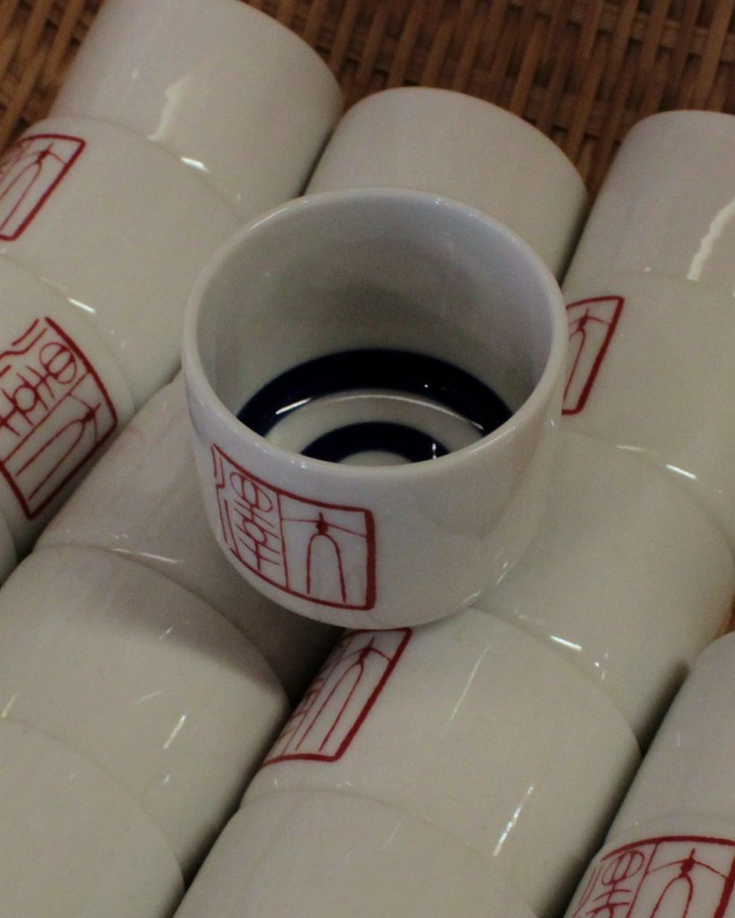 Osawa no Sake souvenir cups in Omicho Fish Market, Kanazawa, Japan