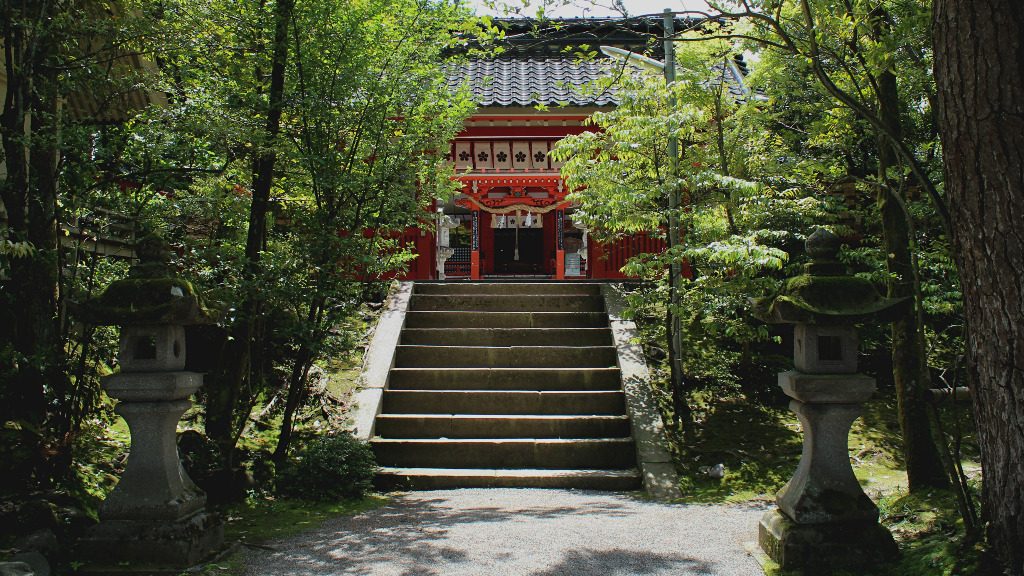 The canopied stairway to the vermillion pained Kanazawa Shrine.