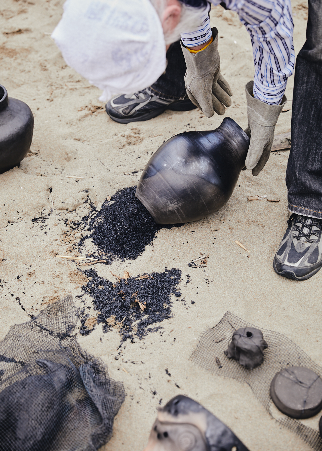 The silver on this earthenware piece shows exposure to the hotest areas of the fire.