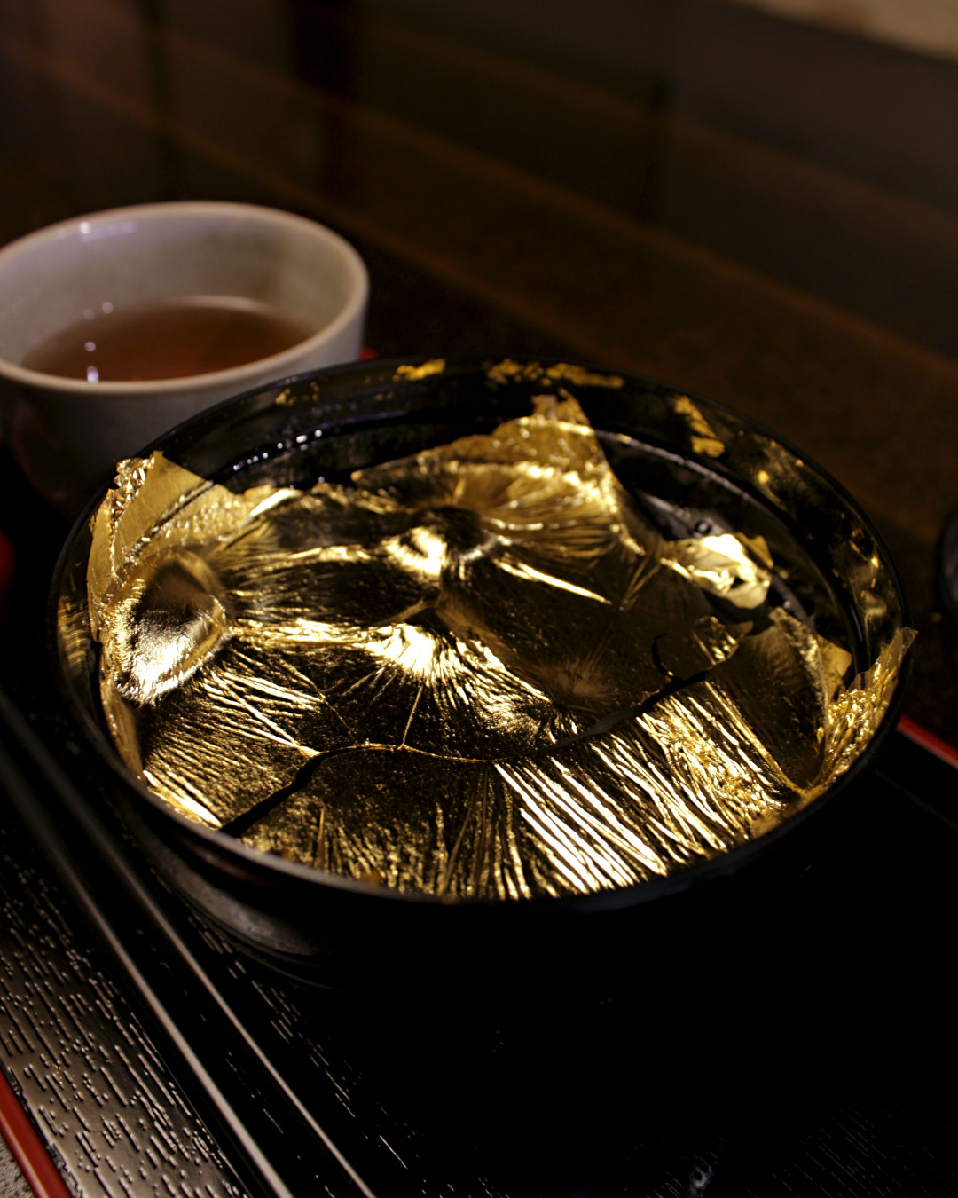 Gold Leaf atop Sweet Bean Soup at Kaikaro Tea House in Higashi Chaya Geisha District, Kanazawa, Japan