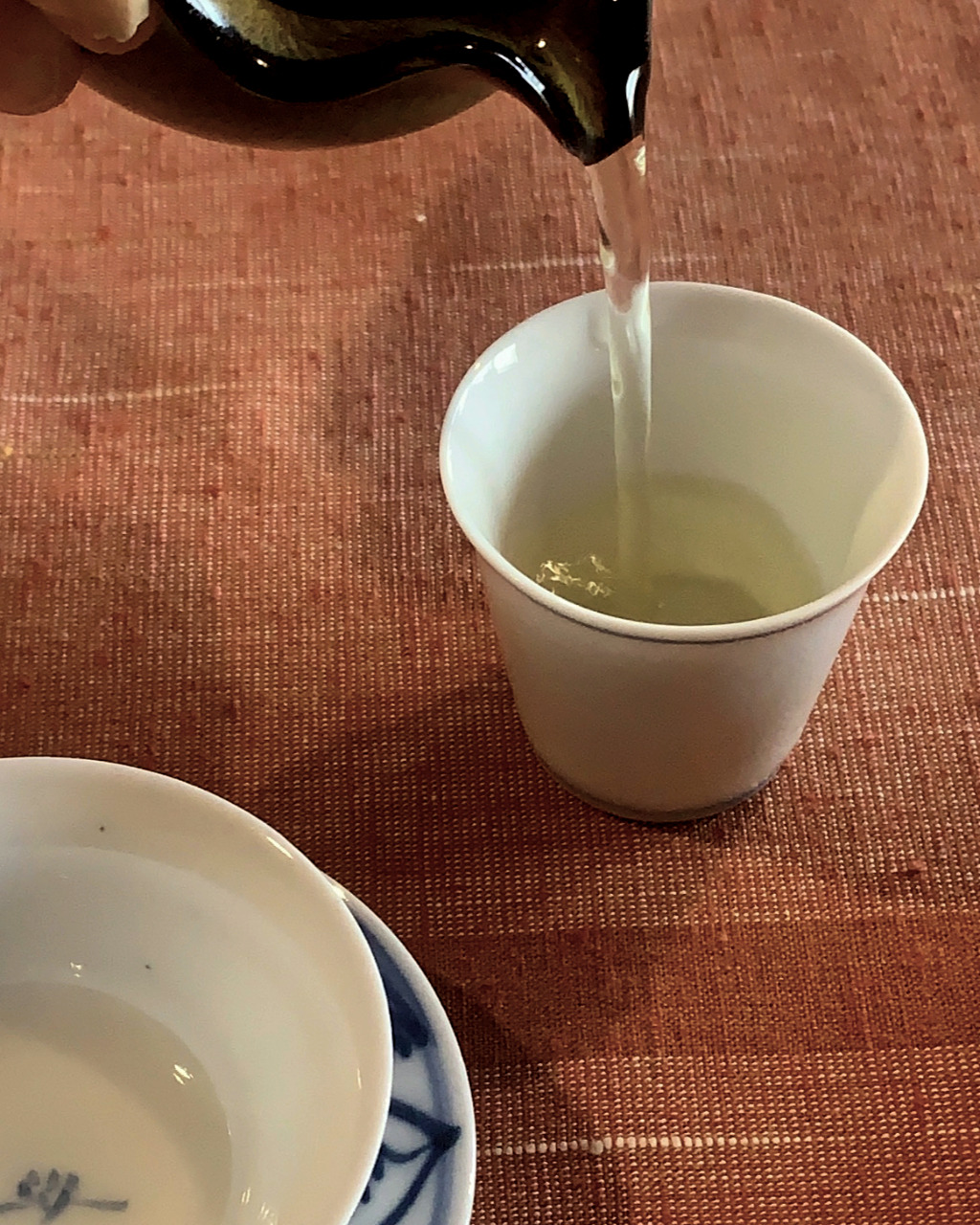 Pouring sencha tea at Mikoto Tea House in Kanazawa, Japan