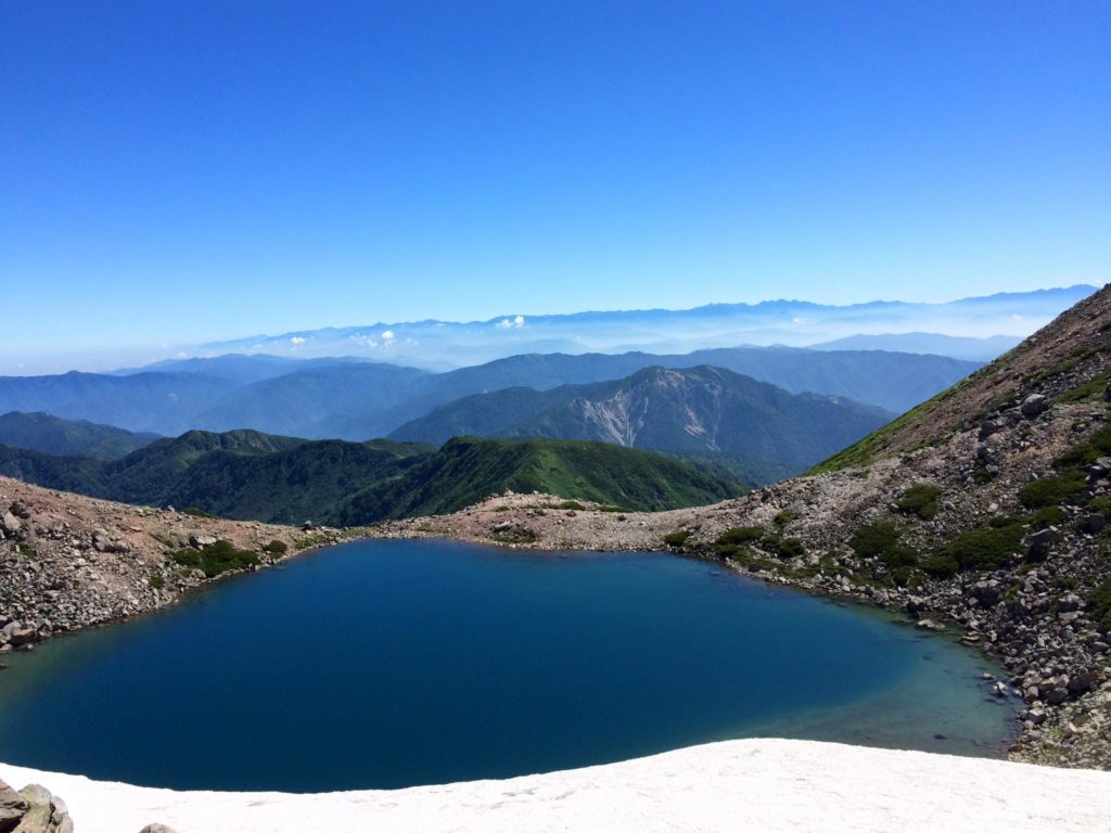 Midori-ga-Ike Lake at the top of Mount Haku on a clear day