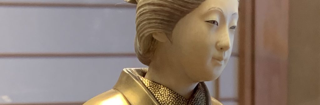 gold and ivory geisha doll in the western geisha district in Kanazawa
