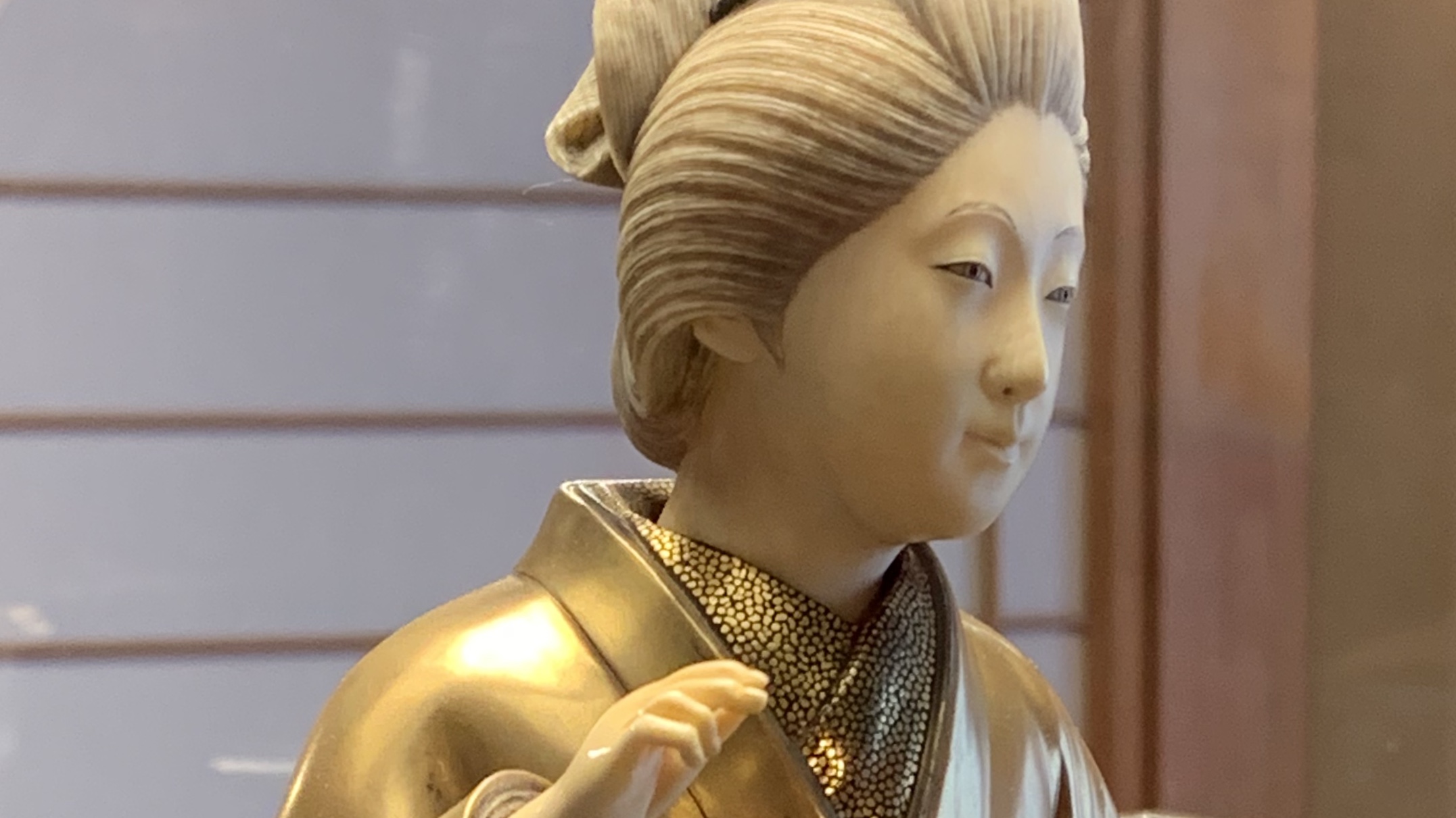 gold and ivory geisha doll in the western geisha district in Kanazawa