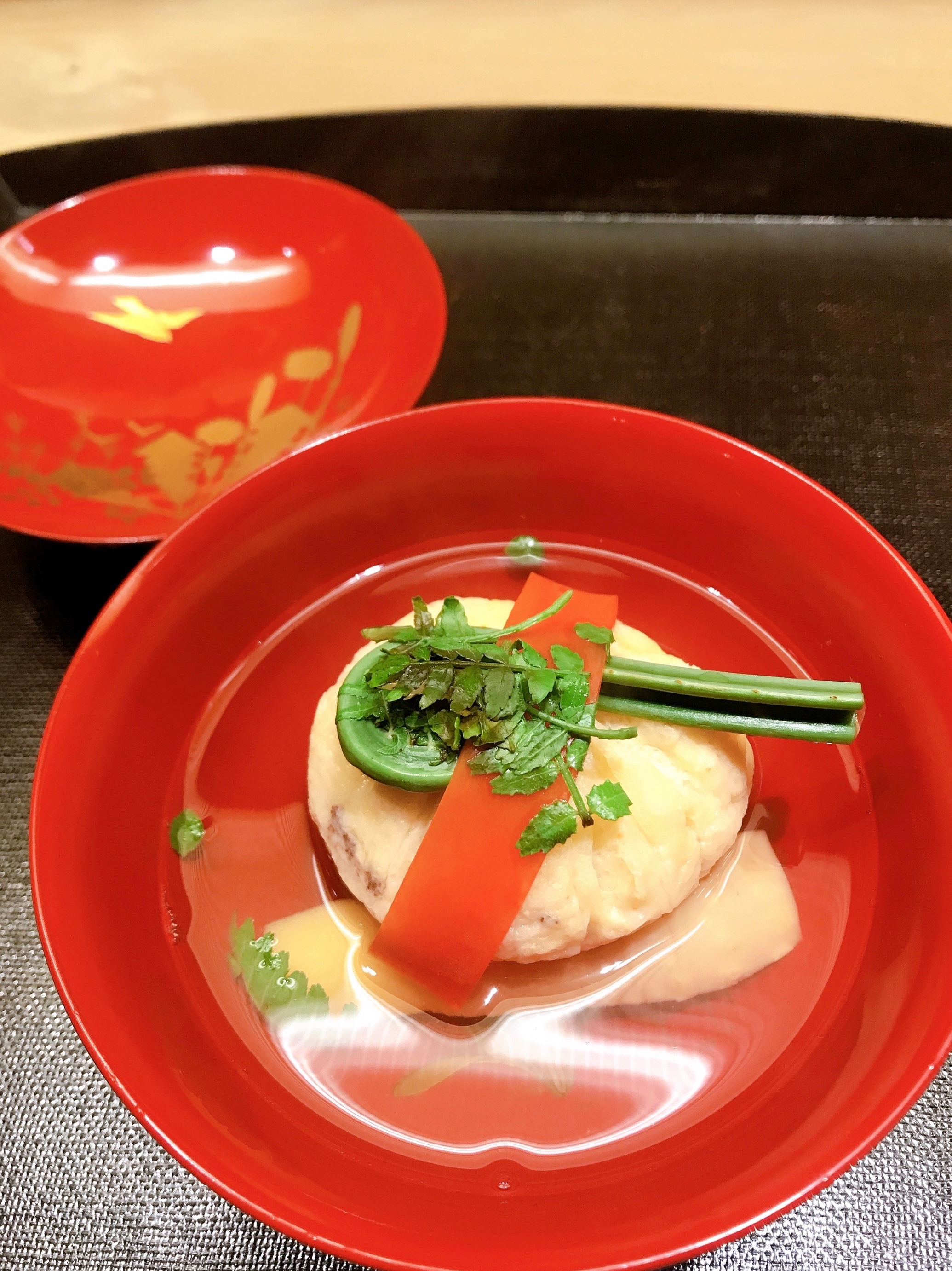 A bowl of carefully prepared soup at Yokoyama in Kanazawa, Japan