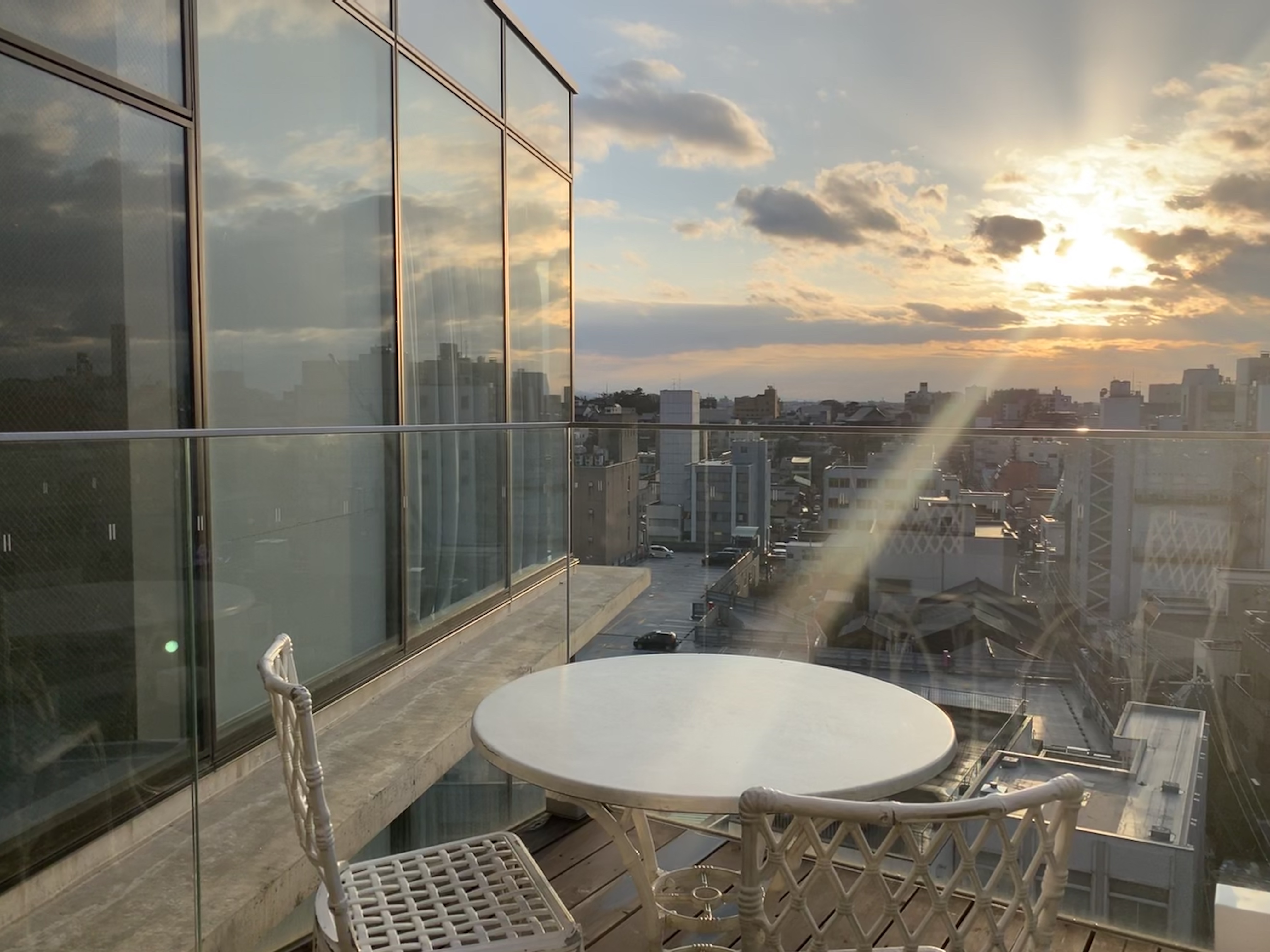 Sunset over the 9th floor balcony of Kaname Inn Tatemachi, photo by Rachel Quinn