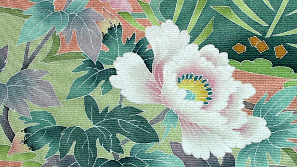 Close up of a flower and leaves painted on Kaga-yuzen silk for a kimono