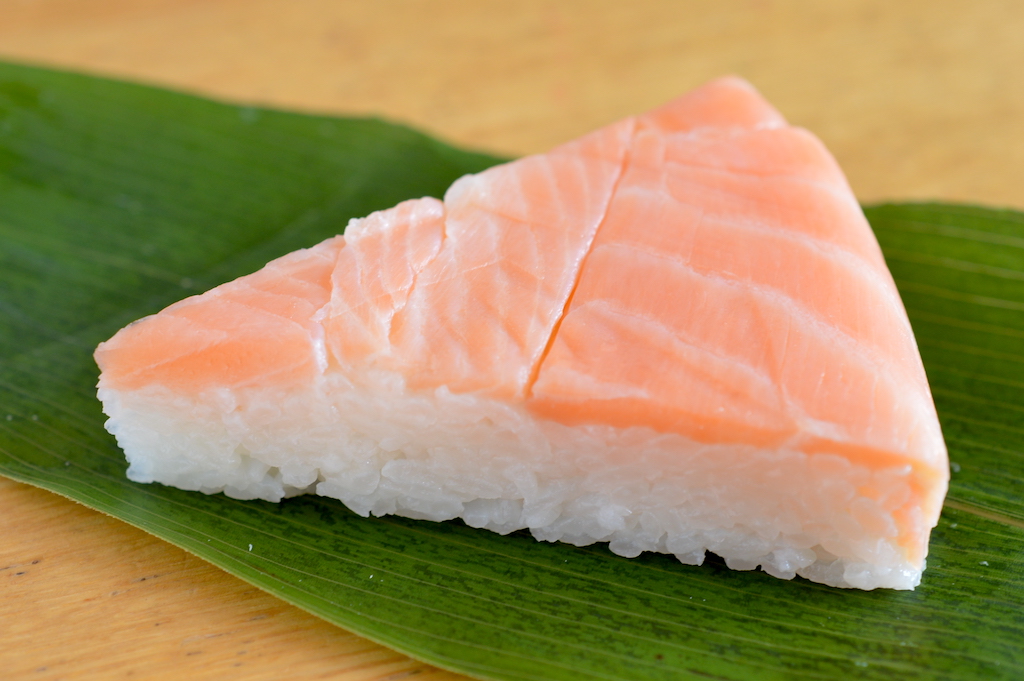 A slice of pressed pickled trout and rice