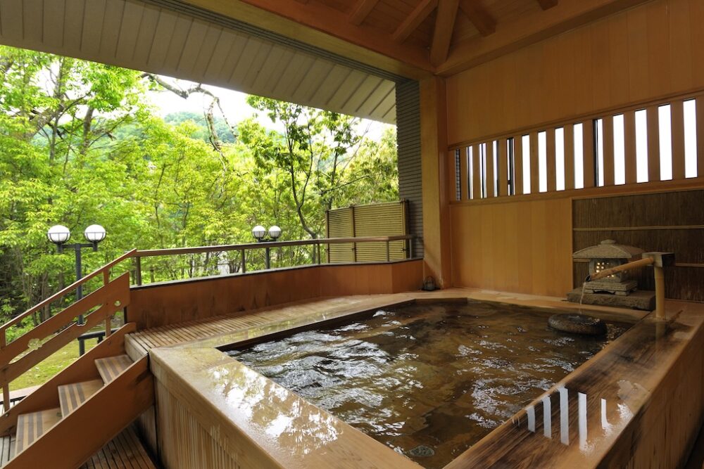 open air onsen bath at ryokan in Yuwaku Onsenphoto courtesy of the City of Kanazawa