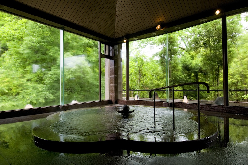 onsen bath at ryokan with forest view in Yuwaku Onsenphoto courtesy of the City of Kanazawa