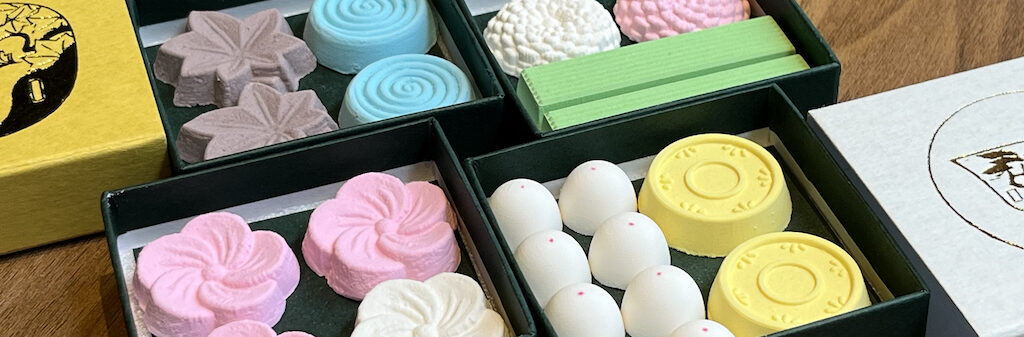 A selection of seasonal and year-round rakugan candies in small boxes from Moroe Rakugan in Kanazawa