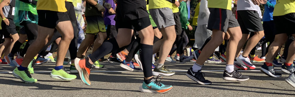 Feet of the first wave of runners for the Kanazawa Marathon