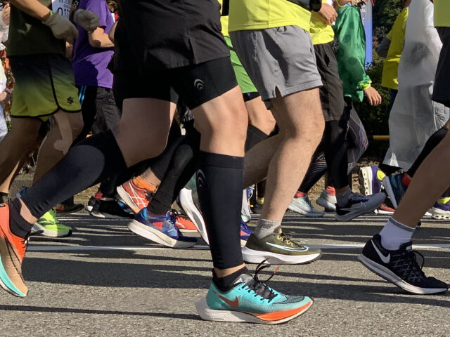 Feet of the first wave of runners for the Kanazawa Marathon
