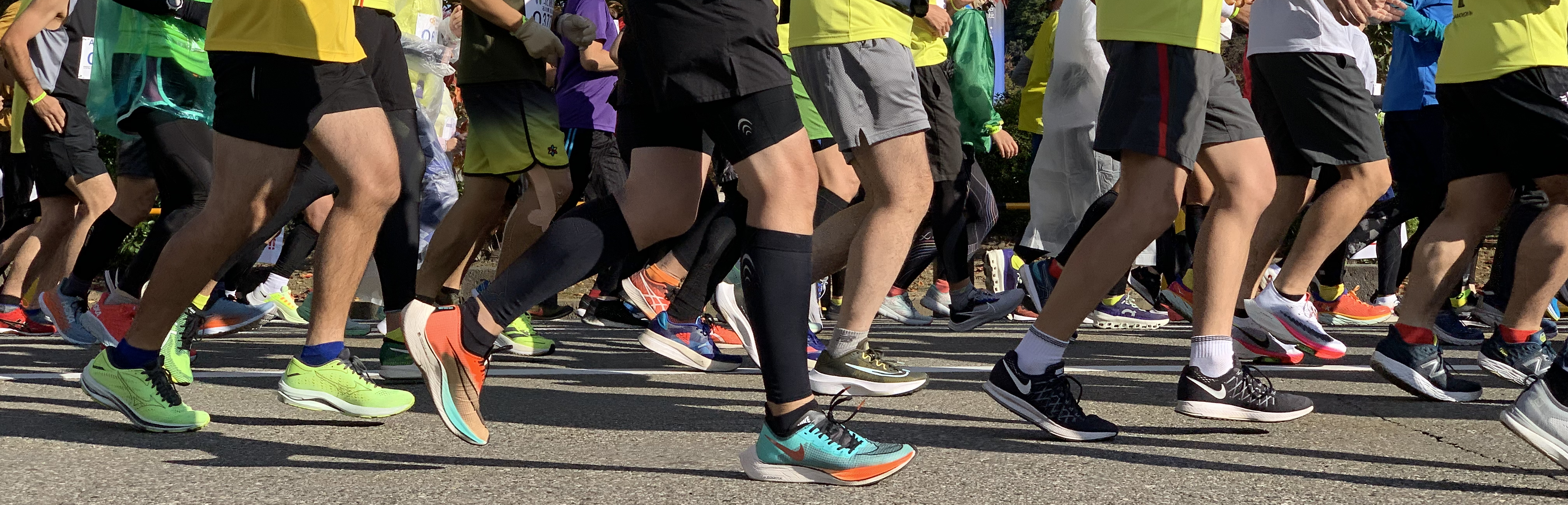 Feet of the first wave of runners for the Kanazawa Marathon